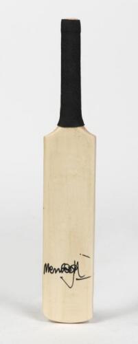 MERV HUGHES: A miniature cricket bat signed by Merv Hughes