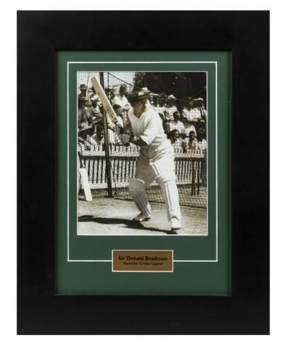 SIR DONALD BRADMAN: A framed tinted photograph of Sir Donald Bradman