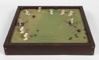 CRICKET GAMES: A vintage tabletop cricket game, with felt playing surface, deployable lead fielders and steel ball bearings, the bowler and batsman both spring loaded, 7cm high, 48.5cm wide, 48.5cm deep - 3