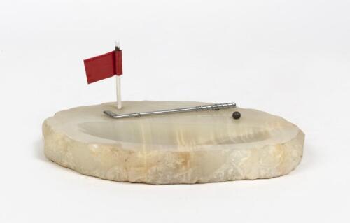 DESK PIECE: A carved alabaster NOVELTY golf themed desk piece, 16cm wide