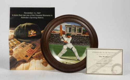 SIR DONALD BRADMAN: A framed commemorative plate featuring Sir Donald Bradman painted by R. Coady with COA, commemorating Bradmans 100 centuries in fewer innings than any other players in history at the SCG, 15th November 1947