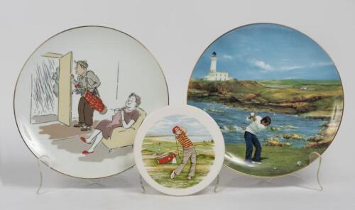 PLATES: A Coalport cabinet plate depicting the ninth hole at Turnberry, Scotland designed by Melvyn Buckley 1991 and a Noritake cabinet plate with a comedy golf related scene, each 27cm diameter