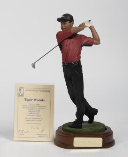 TIGER WOODS: A 1:9 scale limited edition cold-cast porcelain figure of Tiger Woods, with COA from The Art of Sport, edition 132 of 2500, 22.5cm high