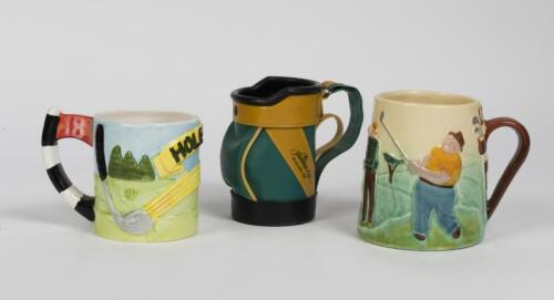 NOVELTY GOLF MUGS: Two large NOVELTY golf themed mugs and a golf bag form stubby holder, the largest mug 12cm high