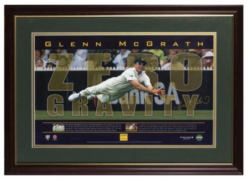 GLENN MCGRATH: A framed signed poster of Glenn McGrath "Zero Gravity" commemorating his memorable catch on day four of the second Ashes test at the Adelaide Oval, November 2002, limited edition 67 of 500, the frame 24 x 30cm