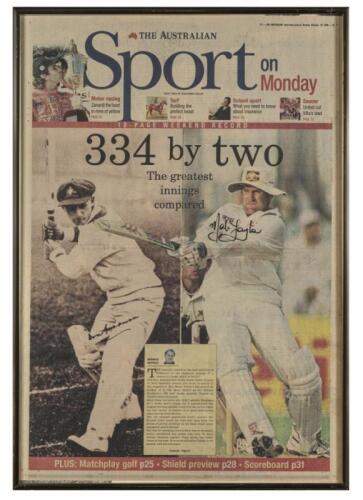 SIR DONALD BRADMAN AND MARK TAYLOR: A framed front page of the Australian newspaper October 19th 1998 featuring photographs of Sir Donald Bradman and Mark Taylor and signed by both men, the frame 59 x 41cm