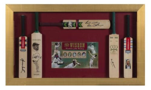MINIATURE CRICKET BATS: A collection of five signed miniature cricket bats in a box frame, including signatures from Sir Donald Bradman and Vivian Richards, the frame 49 x 83 cm