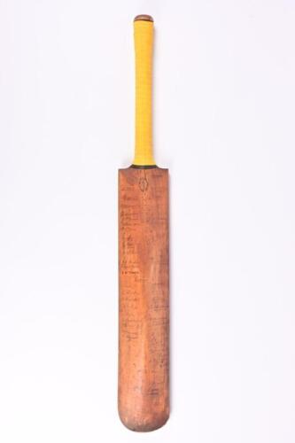 1907/8 CRICKET BAT: A rare and interesting cricket bat signed by the England,&nbsp;Australian,&nbsp;touring Fijian (Mbau Island) and Tasmanian cricket teams during the 1907-1908 Ashes series, including the signature of Victor Trumper. Further identifiable signature