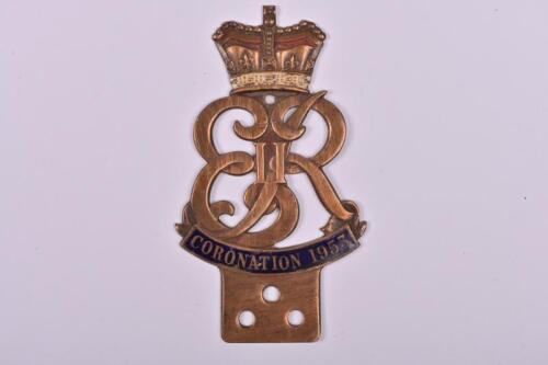 BADGE: A brass commemorative badge issued for the Queens Coronation in 1953