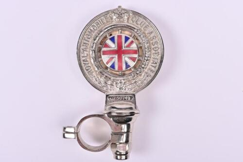 BADGE: A 1930s RAC motorcycle membership badge numbered Z50749, with fitted registration label. "16th June 1931" to rear
