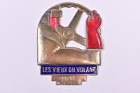 BADGE: A French style enamel badge "Les Vieux du Volant ". Issued 1914