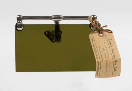 GENERAL MOTORS: An interesting olive glass coloured sun visor (PAT.6-29-26) with attached Lane's Motors of Melbourne swing tag