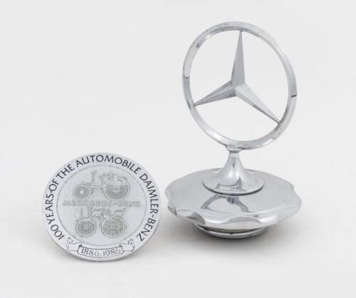 MERCEDES: Two Mercedes items including a radiator mascot (circa 1980s) & 100th anniversary badge