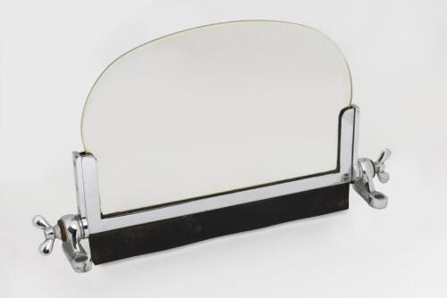 AERO SCREEN: A single windscreen, with base stamped 010084 L & R. Measures 22.5cm high x 41cm wide