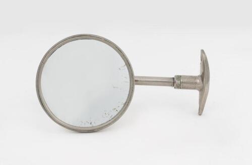 MIRROR: A curved bracket nickel plated rear vision mirror