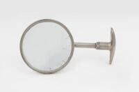 MIRROR: A curved bracket nickel plated rear vision mirror