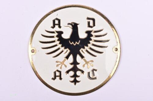 A.D.A.C: A brass A.D.A.C (Allgemeiner Deutscher Automobil Club) car club badge