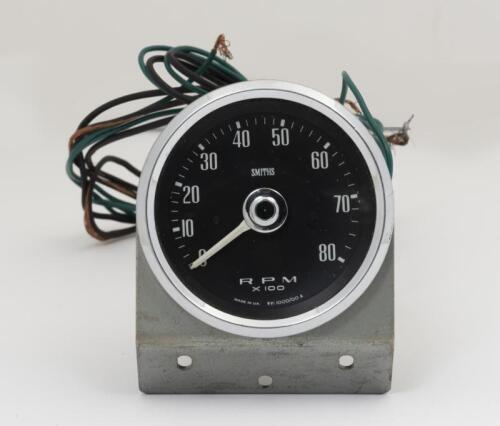 GAUGE: A Smith 8000 R.P.M tacho, with associated bracket