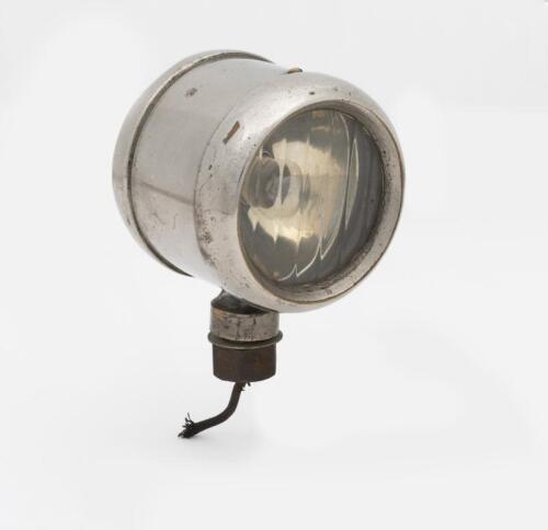 LAMP: A small side lamp, nickel on brass. Measures 8.5cm high x 7cm deep