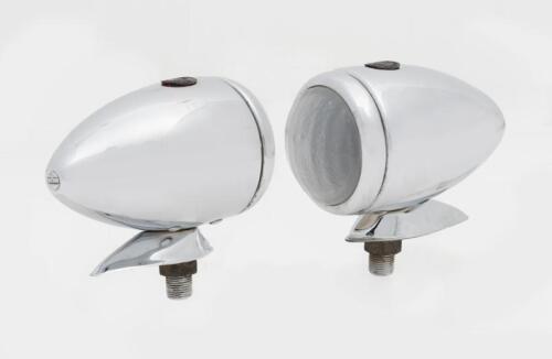 LAMPS: A pair of NOS Lucas (No. 1142) side lamps with illuminated logo medallion