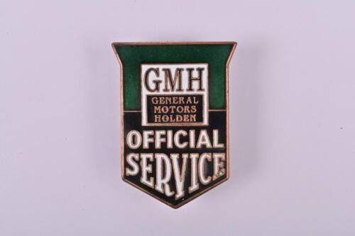 GMH: An early General Motors Holden 'Official Service' brass and enamel lapel badge by Amor, Sydney