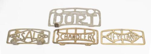 AMERICAN: A collection of assorted 1920's brass running board scuff plates