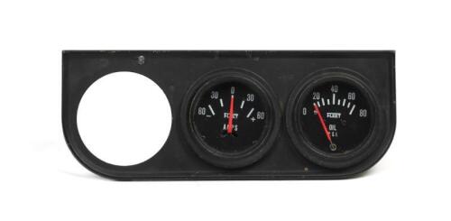 GAUGE: A Fleet AMPS and oil pressure gauge in bracket