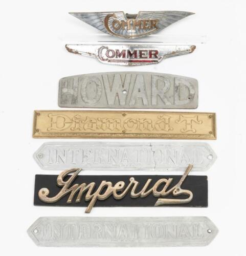 COMMERCIAL EMBLEMS: A collection of mainly commercial vehicle emblems and badges. 'COMMER', 'Diamond T', 'HOWARD', 'INTERNATIONAL' badges