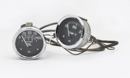 GAUGES: Two AC branded gauges being one for temperature and the other for oil pressure