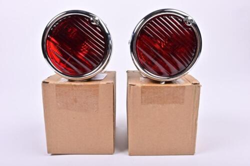 TAIL LAMPS: Two re-issued NOS Lucas tail tamps with ruby red glass and number plate light