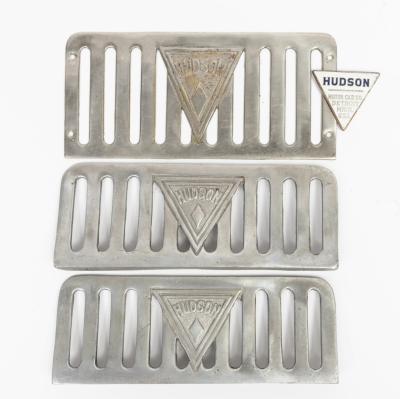 HUDSON: Four HUDSON items including three steel HUDSON running board scuff plates and badge