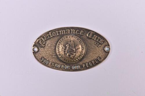 ST. CHRISTOPHER: A small English 'Performance Cars Ltd' St. Christopher oval badge