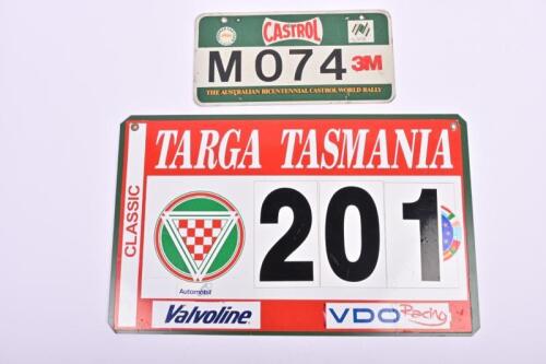 MOTOR EVENT SIGNAGE: Two motor events display signs. 'CASTROL - THE AUSTRALIAN BICENTENNIAL CASTROL WORLD RALLY - M 074' display plate