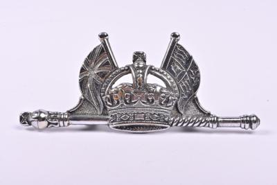 HEADER: A Royal grill bar badge displaying Crown with British flags