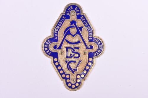 AUTOMOBILE CLUB DEUX-S&Egrave;VRES, CHARENTE, VENDEE: A brass 'AUTOMOBILE CLUB DEUX-SEVRES, CHARENTE, VENDEE' car badge