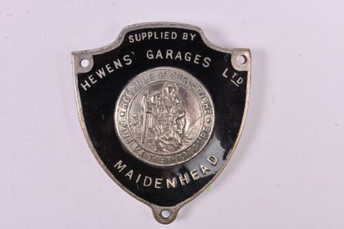 ST. CHRISTOPHER: An English dash mounted enamel St. Christopher badge supplied by Hewen's Garage Ltd, Maidenhead