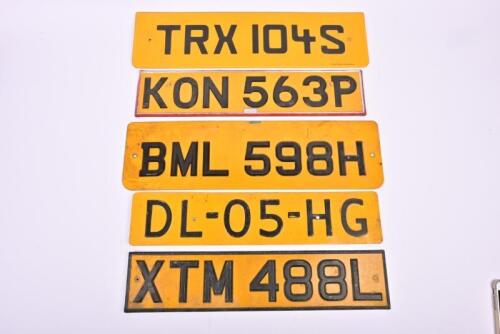 U.K PLATES: Five yellow and black United Kingdom 'back' number plates