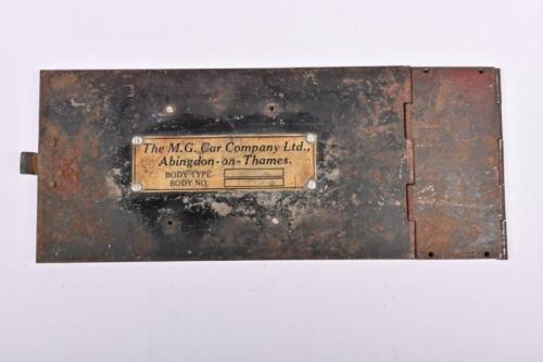 M.G TF: A circa 1950's original M.G TF winged spare tool compartment. Chassis Plate for 'BODY NO.16739'