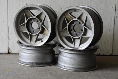 ALLOY WHEELS: A set of GLOBE style wheels.&nbsp;Casting &nbsp;&lsquo;7JJ x 15&rsquo; and &lsquo;PT. NO. 7015&rsquo; &nbsp;