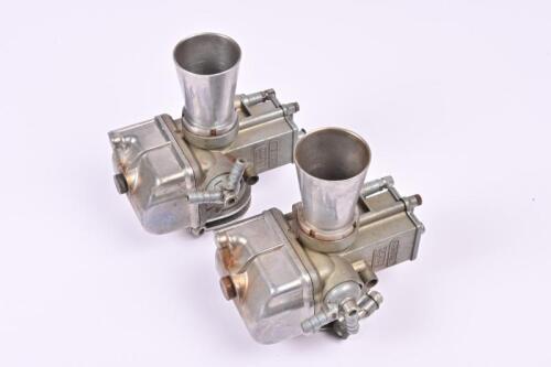 MV: A pair of 1970s Dellorto 'VHB 27 A S' carburettors with trumpets