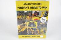 JORDAN: 'Against The Odds - Jordan's Drive To Win' softcover book. Signed Jordan, Harald-Frentzen, Trulli.
