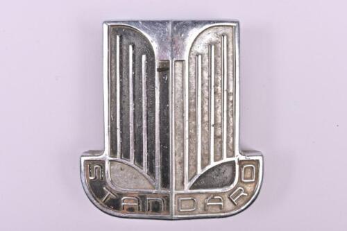 STANDARD: A Standard car badge
