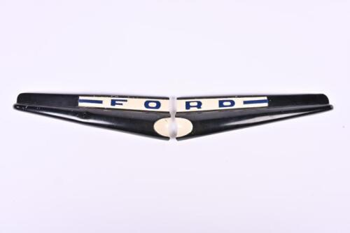 FORD: A Ford F-1 badge. Circa 1946