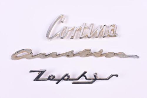 CAR BADGES: An assortment of original car badges - 'Austin', 'Cortina', 'Zephyr'
