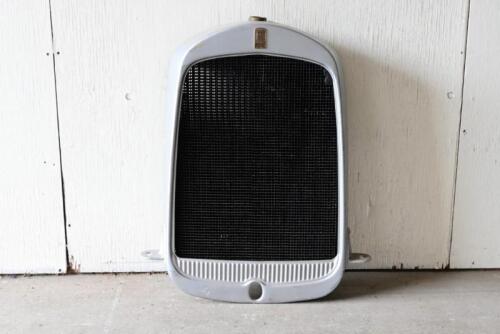 WHIPPET: An early Whippet radiator. Associated dog bone radiator cap