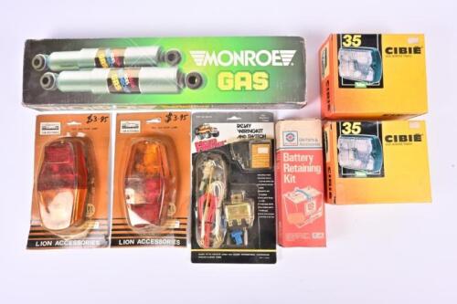 AUTOMOTIVE PARTS: A group of new old stock automotive parts. CIBIE driving lamps