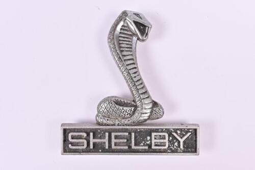 SHELBY: A 'SHELBY' Cobra Mustang car badge, circa late 1960's/early 1970s