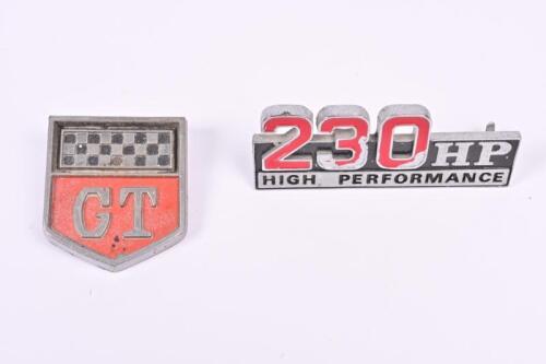 FORD: Two Ford Performance car badges. 'GT' & '230 HP HIGH PERFORMANCE' badges