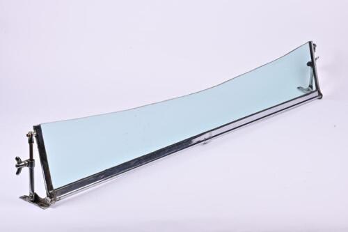 SCREEN: A circa 1920s tinted sun visor with adjustable mounting brackets, Model No. 4030