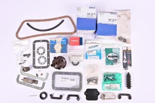 PORSCHE: A box of Porsche 912 assorted parts. Oil filters, distributor cap, gaskets